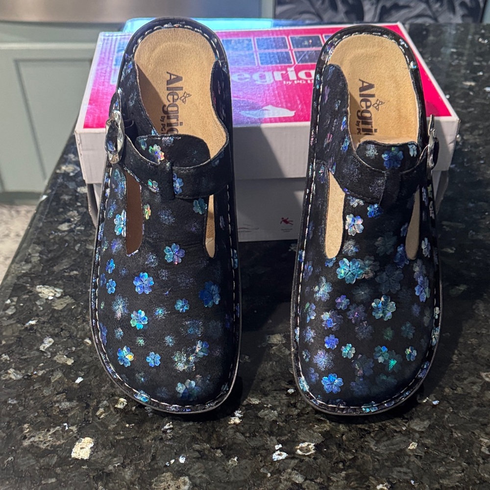 Alegria Black Floral Clogs with Blue Accents